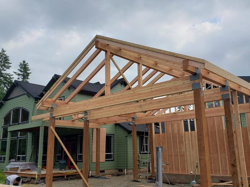 Addition rafters and beam framing by ArchAngel Construction Services