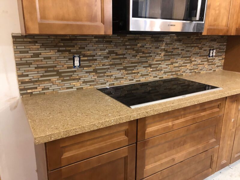 Finished kitchen countertop and tile backsplash detail