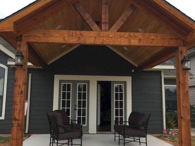 Cedar gable patio cover with French doors by ArchAngel Construction Services